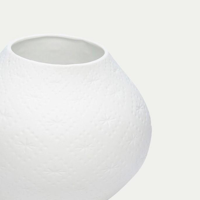 Another close up of a Hubsch Interior coral tea light holder in white porcelain on white background